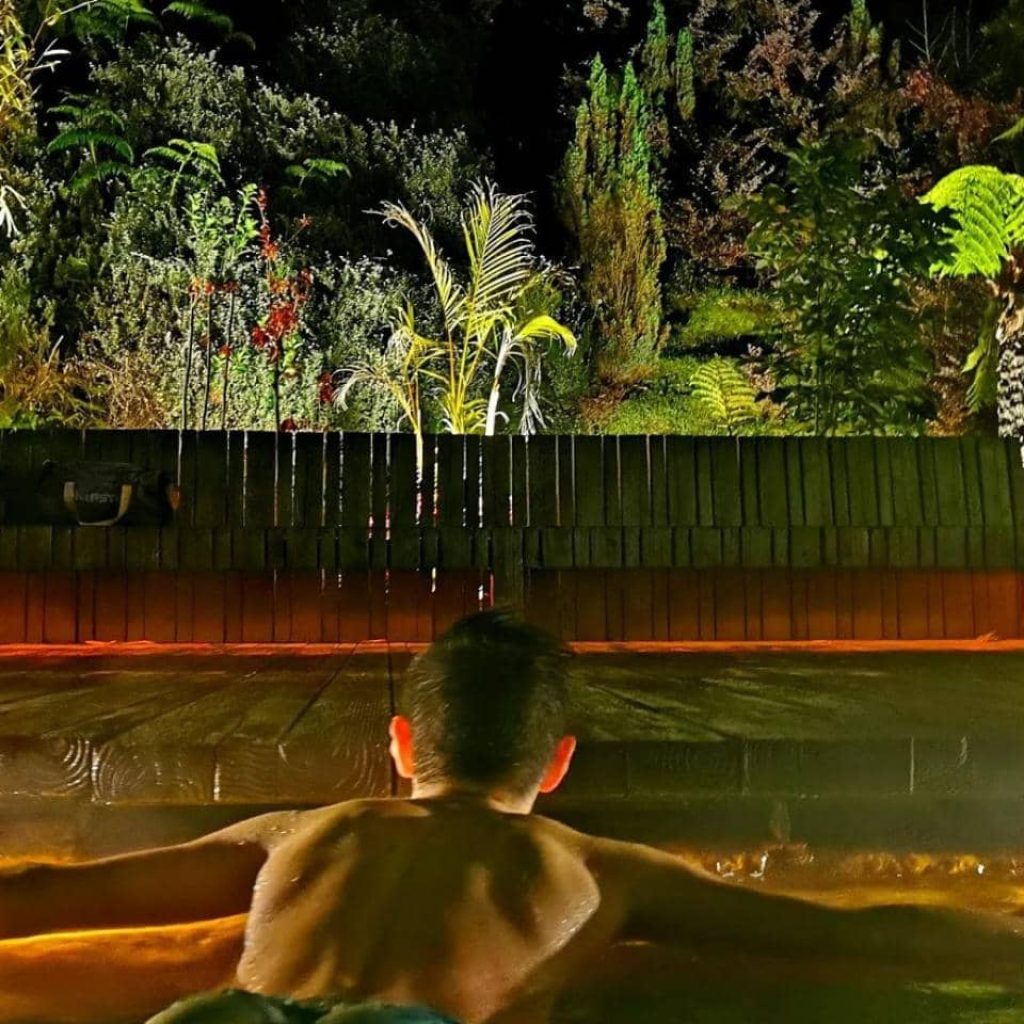 Tourist at thermal pool Poça da Dona Beija