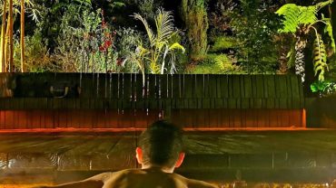 Tourist at thermal pool Poça da Dona Beija