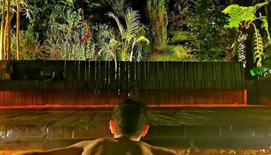 Tourist at thermal pool Poça da Dona Beija